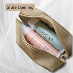 Goudkleurige Toilettas met ruime opening, geschikt voor het meenemen van krullenproducten en verzorgingsartikelen.