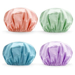 Set van vier satijnen Douchemutsen in pastelkleuren voor bescherming van krullendhaar en cgmethode gebruik.