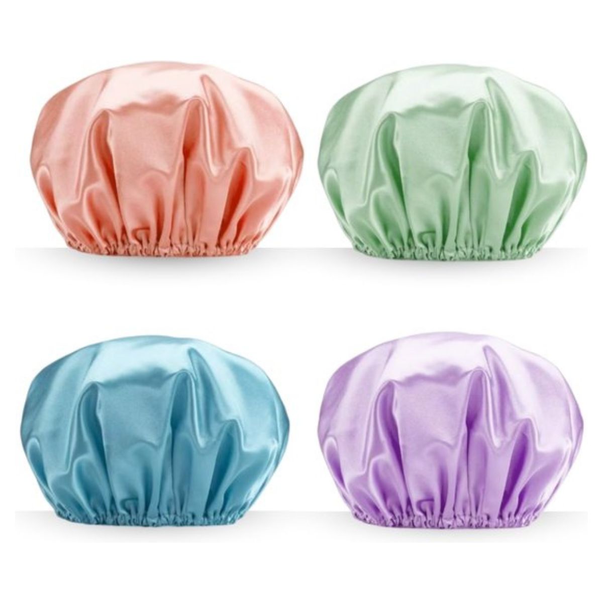 Set van vier satijnen Douchemutsen in pastelkleuren voor bescherming van krullendhaar en cgmethode gebruik.