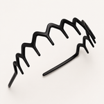 Flexibele haarband met lange tanden